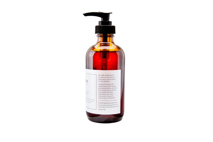 Eight ounce Facial Cleansing Oil and Serum bottle with label visible