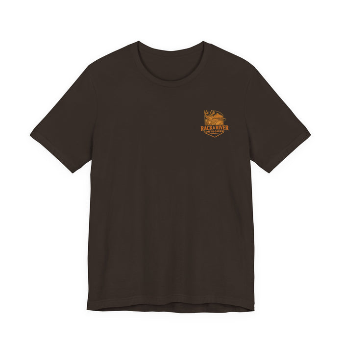 Brown Christian outdoor lifestyle t-shirt featuring small Rack & River Outdoors deer logo on the left chest, product display on white background.