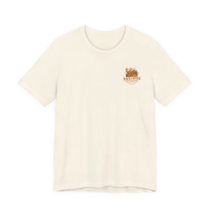 Tan Christian outdoor lifestyle t-shirt featuring small Rack & River Outdoors deer logo on the left chest, product display on white background.