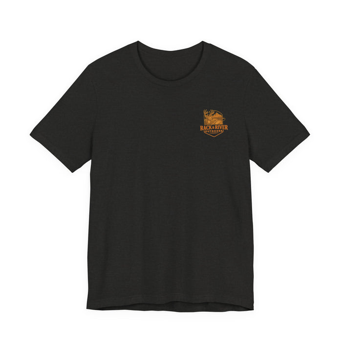 Dark gray Christian outdoor lifestyle t-shirt featuring small Rack & River Outdoors deer logo on the left chest, product display on white background.
